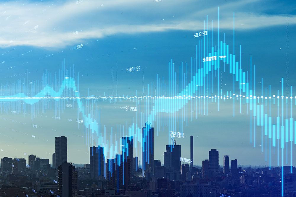 City skyline with digital financial graph overlay, illustrating data trends and urban economic growth.